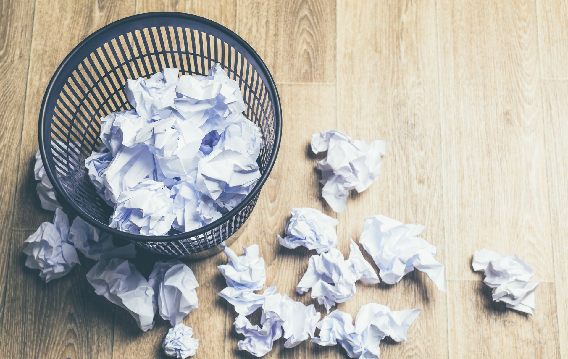 waste paper basket with Paper balls in a bin